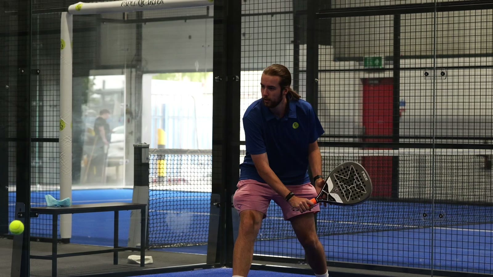 Players mid-match at Padel Quarter