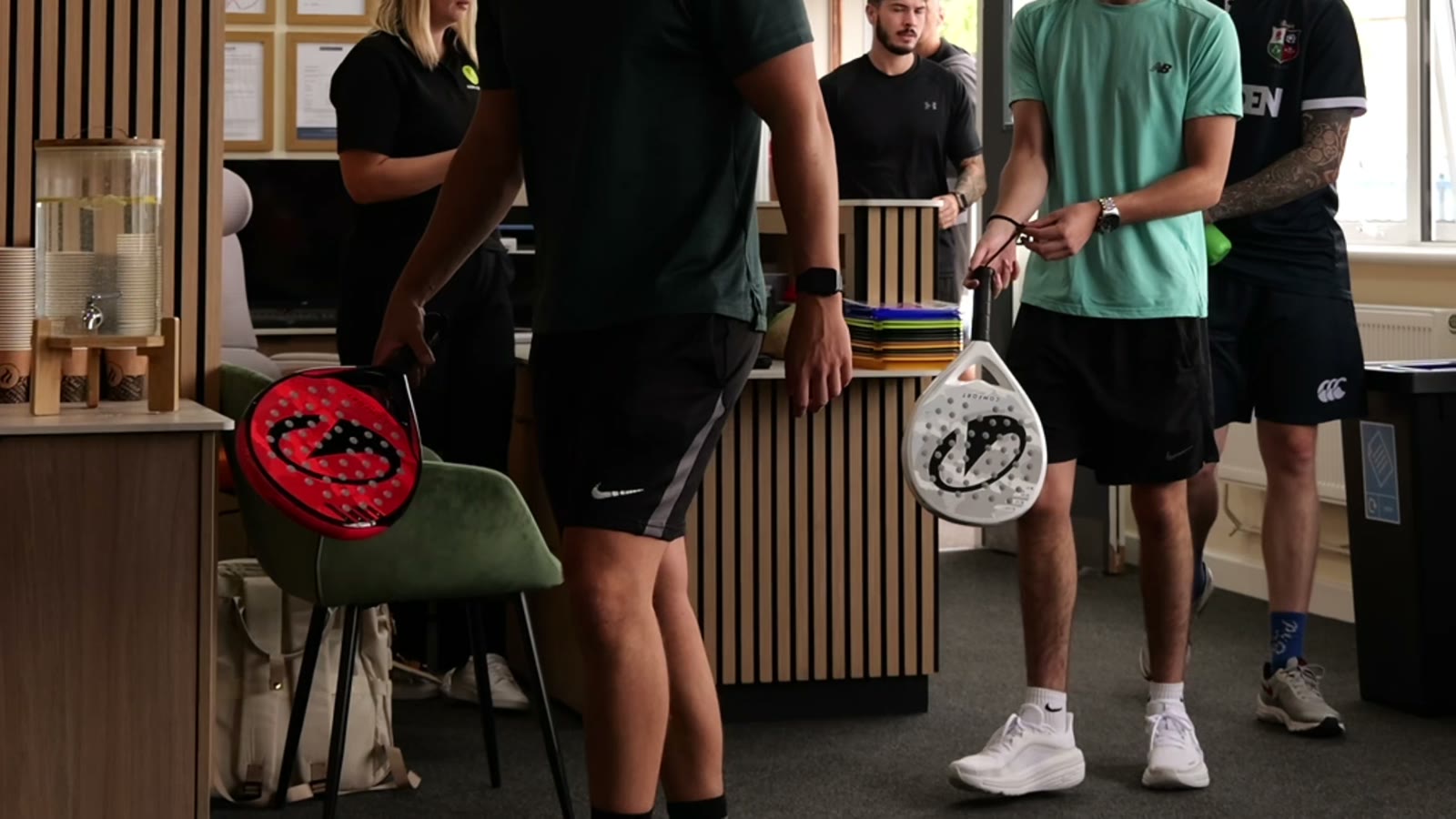 Players at the Padel Quarter reception desk
